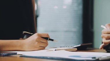 businessman writing notes on a notebook. business concept. work in the office.