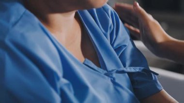 doctor checking the patients hand