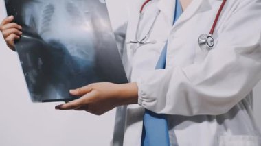 doctor examining x - ray in clinic