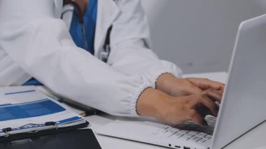 doctor in the office. doctor is sitting at the desk