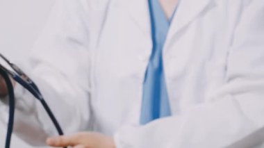 medical doctor holding stethoscope, medical doctor hand.