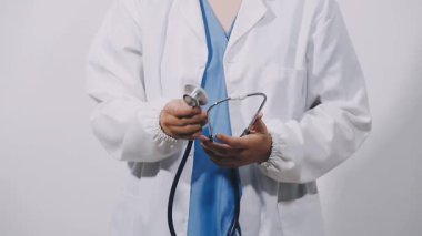 doctor in a white uniform and a white thoscope