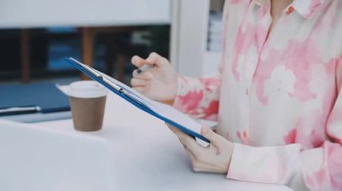Accountant black woman working on laptop and do document, tax, exchange, accounting and Financial advisor concept.