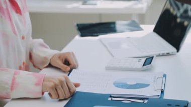Accountant black woman working on laptop and do document, tax, exchange, accounting and Financial advisor concept.