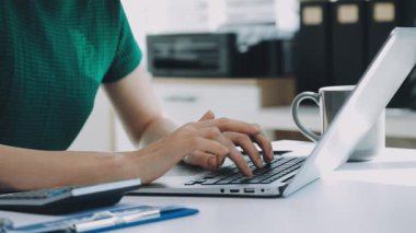 Accountant black woman working on laptop and do document, tax, exchange, accounting and Financial advisor concept.
