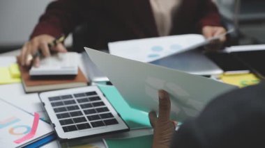 young businesswoman holding paper document