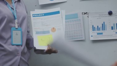 business people working at office and discussing business plan on paper in office, planning and brainstorming concept