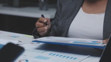 close up of businesswomen working in modern office