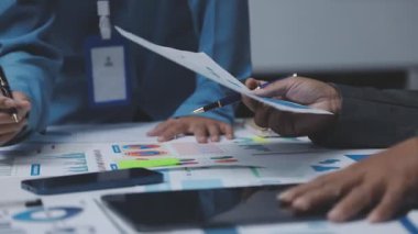 business people meeting, discussion, teamwork and brainstorming concept - team working in office