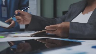 close - up of business partners making a new contract in modern office