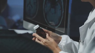close up of male doctor with x - ray scan.