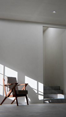 Boş bir sanat stüdyosunun ya da tefekkür odasının minimalist üç boyutlu iç mekanı. Ahşap ve kumaş sandalye güçlü bir öğleden sonra güneşi ve gölgeyle yıkandı. Şövalesi ve merdivenleri olan modern, boş bir oda. Barış, yalnızlık, sanat ve tasarım kavramı.