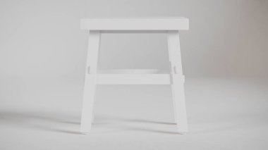 Üç boyutlu minimalist tahta tabure, açılı bacaklar, destek kirişleri ve pürüzsüz bitiş. Mobilya katalogları, ürün görselleştirme, iç tasarım projeleri ve modern dekor sunumları için mükemmel..