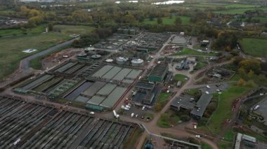 High Altitude Aerial View Of Massive Wastewater Treatment Plant With Circular Clarifiers And Settlement Ponds In Soar Valley Leicester