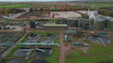 High Altitude Aerial View Of Massive Wastewater Treatment Plant With Circular Clarifiers And Settlement Ponds In Soar Valley Leicester