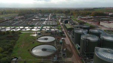 High Altitude Aerial View Of Massive Wastewater Treatment Plant With Circular Clarifiers And Settlement Ponds In Soar Valley Leicester
