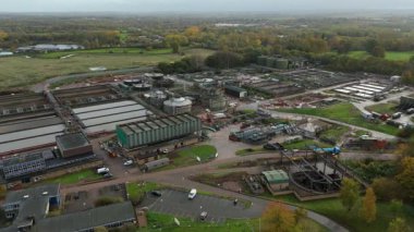High Altitude Aerial View Of Massive Wastewater Treatment Plant With Circular Clarifiers And Settlement Ponds In Soar Valley Leicester