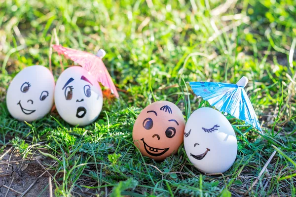 Funny eggs imitating happy mixed couple and indignant white coup — Stock Photo, Image