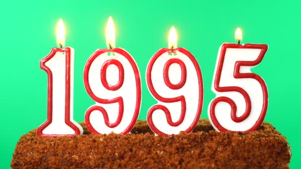 Cake with the number 1995 lighted candle. Last century date. Chroma key. Green Screen. Isolated — Stock Video