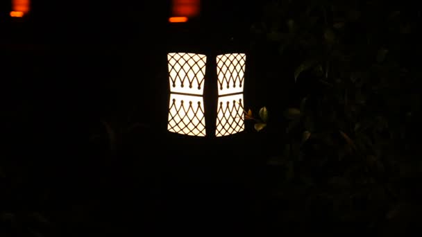 Decorative Small Solar Garden Light, Lanterns lighting at night. — Stock Video