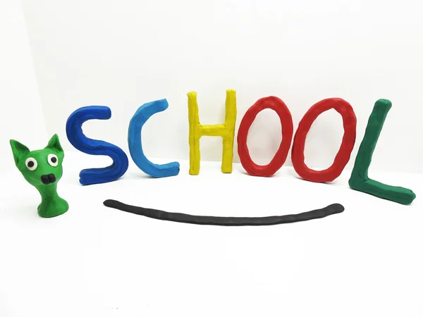 The word school made from plasticine. — Stock Photo, Image