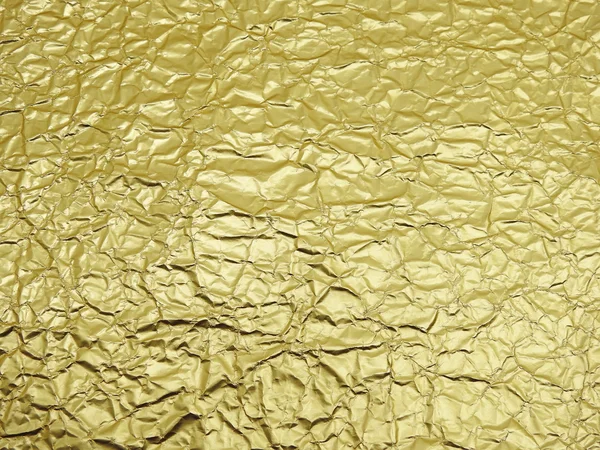 Monotone texture of the golden foil. — Stock Photo, Image