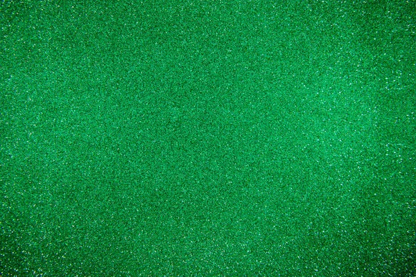 緑の背景がキラキラ モノトーンの光沢のある背景写真 — ストック写真