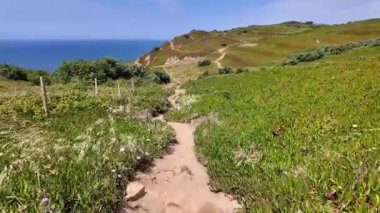 Atlantik kıyısı Portekiz seyahat macerası Cabo da Roca manzaralı okyanus yürüyüşü turizmi deneyimi