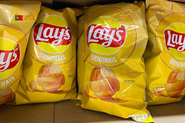 Multiple Yellow Bags of Lay's Original Potato Chips