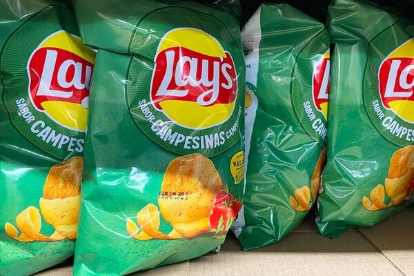 Lay's Sabor Campesinas Potato Chip Bags on a Store Shelf
