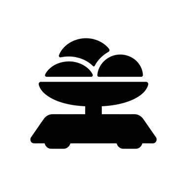 This vector icon features a black, old-fashioned scale. Resting atop the scale's weighing plate are three rounded objects, suggesting produce or items being measured.