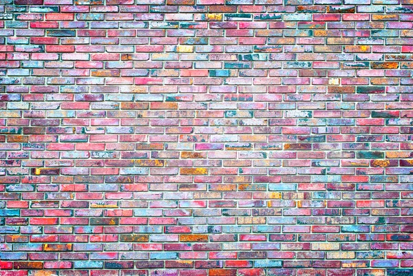 A brick wall colored mosaic