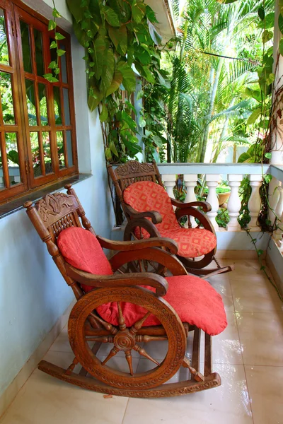 Rocking chairs on the veranda. India