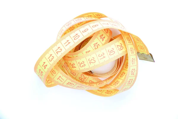 Santimetre sarı renk ölçüm uzunluğu ve birim üzerinde beyaz bir arka plan için kumaştan