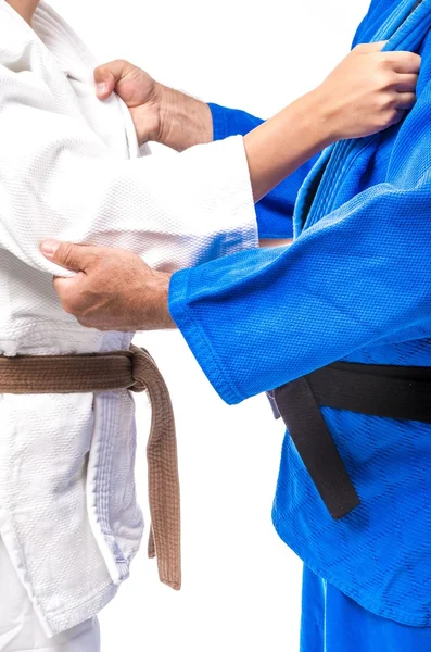 Stałego łuk żeński judo brązowy pas do jej sensei czarny pas — Zdjęcie stockowe