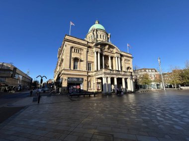 Hull, East Yorkshire, UK, November 13th 2025 Carr Ln, Historic Stone Building With Green Dome In City Square Under Clear Blue Sky