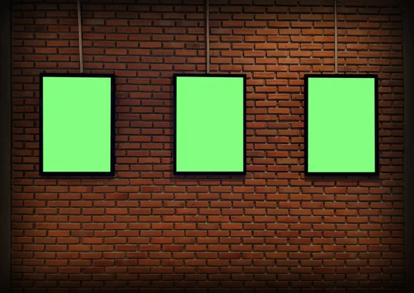 Three blank posters on a brick wall.Alternate files. Blank posters
