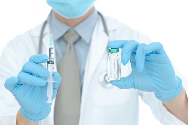 vaccines fight against virus, doctor or scientist in laboratory holding a syringe with liquid vaccines. Concept:diseases,medical care