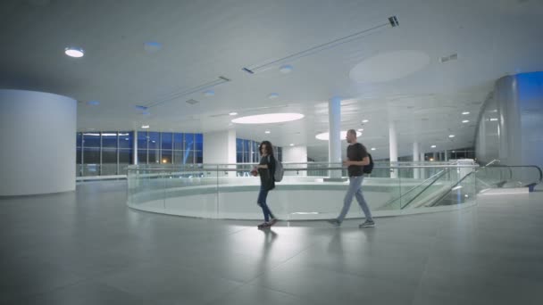 A young couple is waiting for the trip at the airport — Stock Video