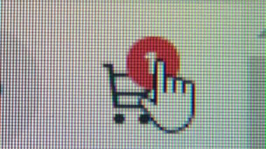 Makro fotoğrafçılık, alışveriş arabası simgesi bilgisayar ekranında.