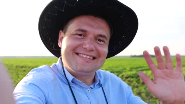 Portrait of a smiling young farmer looking at camera. — Stock Video