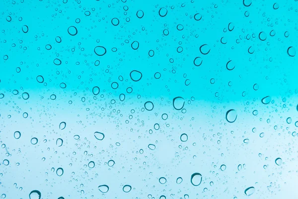 Вода Падає Тло Вода Падає Скло Над Блакитним Небом — стокове фото