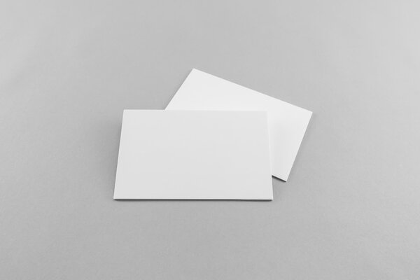 Blank business card, postcard with soft shadows.