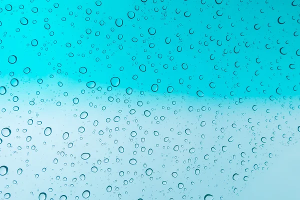 Gotas Agua Fondo Gotas Agua Ventana Cristal Sobre Cielo Azul — Foto de Stock