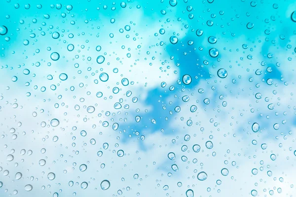 Gotas Agua Fondo Gotas Agua Ventana Cristal Sobre Cielo Azul —  Fotos de Stock