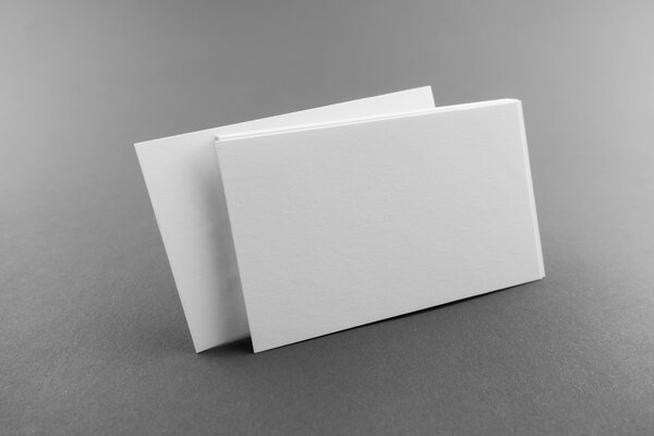 Blank business card, postcard with soft shadows.