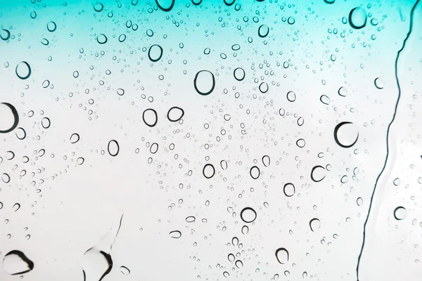 Gotas Agua Fondo Gotas Agua Ventana Cristal Sobre Cielo Azul —  Fotos de Stock