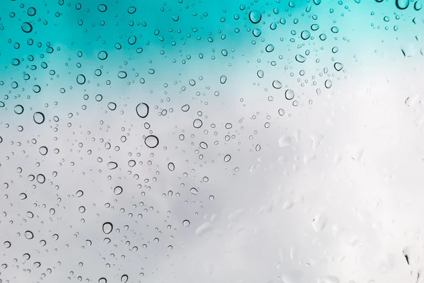 Gotas Agua Fondo Gotas Agua Ventana Cristal Sobre Cielo Azul —  Fotos de Stock