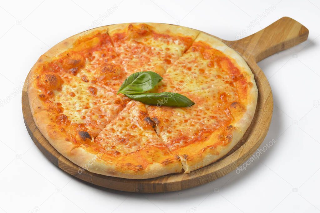 Traditional Pizza Margarita. Margherita pizza on wooden board isolated on white. Fast food, junk food concept. Traditional Italian cuisine isolate.