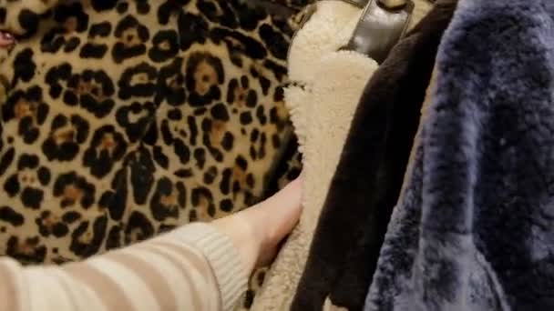 Close Woman Choosing Luxury Wool Warm Winter Coats Winter Sale — Stock Video